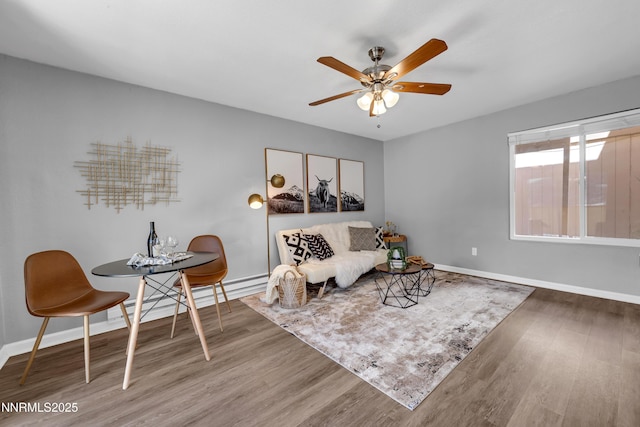 3951 Clear Acre Ln Unit 293, Reno, NV 89512 - sitting room with wood finished floors, baseboards, and a ceiling fan