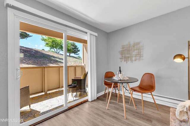 3951 Clear Acre Ln Unit 293, Reno, NV 89512 - dining area featuring wood finished floors and baseboards