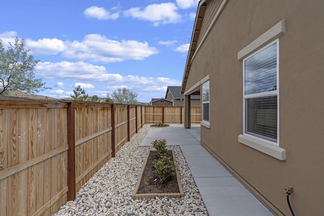 7480 Souverain Ln, Reno, NV 89506 - fenced backyard with a patio area