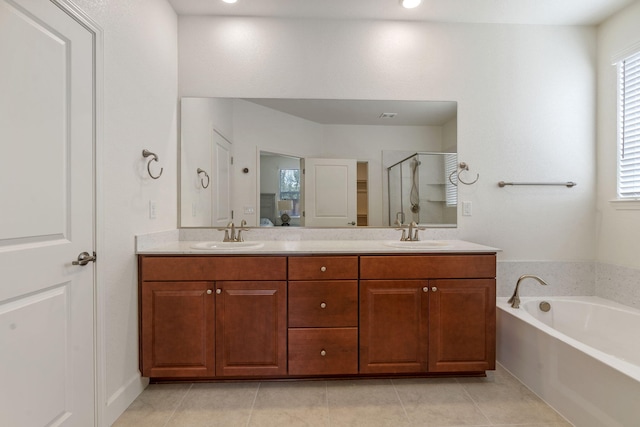 7480 Souverain Ln, Reno, NV 89506 - full bathroom with a shower stall, double vanity, a bath, and tile patterned flooring