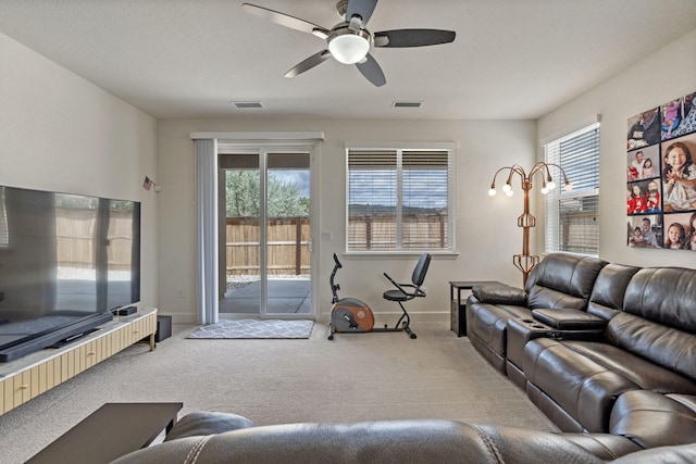 7480 Souverain Ln, Reno, NV 89506 - carpeted living room featuring ceiling fan and baseboards