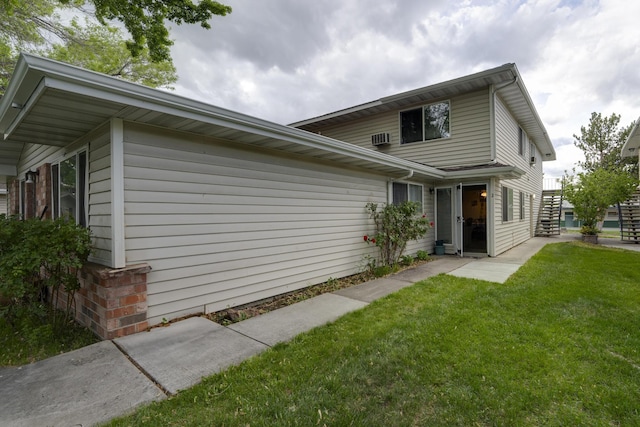 4941 Catalina Dr Apt 2, Reno, NV 89502 - back of house featuring a lawn