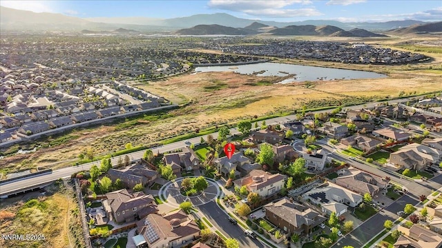 2675 Weymoor Ct, Reno, NV 89521 - aerial overview of property's location featuring a water and mountain view and nearby suburban area