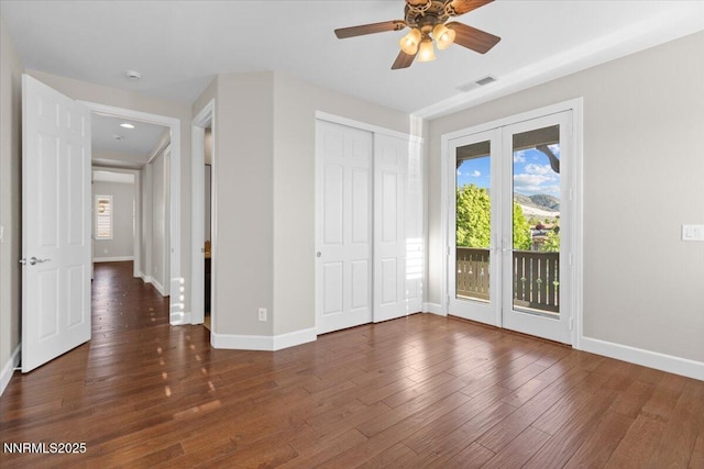2675 Weymoor Ct, Reno, NV 89521 - unfurnished bedroom with french doors, access to exterior, baseboards, and wood finished floors
