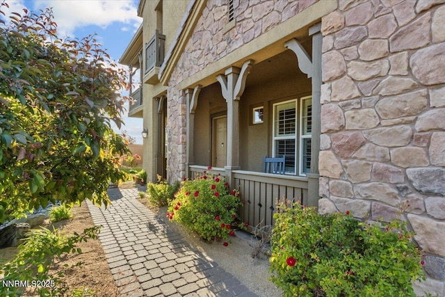 2675 Weymoor Ct, Reno, NV 89521 - property entrance with stone siding and covered porch