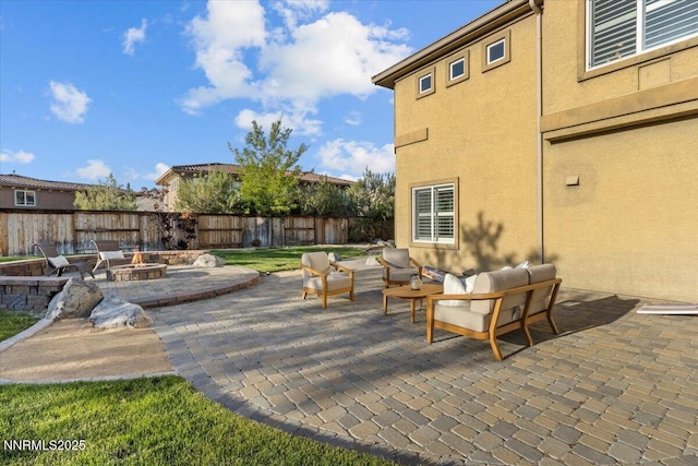 2675 Weymoor Ct, Reno, NV 89521 - view of patio featuring an outdoor living space with a fire pit