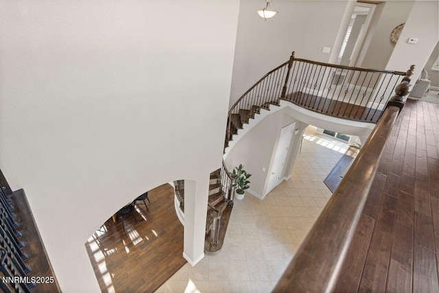 2675 Weymoor Ct, Reno, NV 89521 - stairway featuring a high ceiling