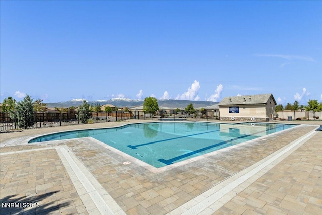 2675 Weymoor Ct, Reno, NV 89521 - view of pool with a patio area and a mountain view