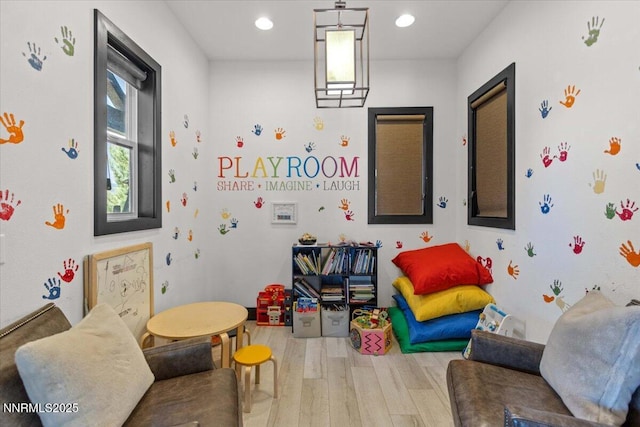 2675 Weymoor Ct, Reno, NV 89521 - rec room with wood finished floors and recessed lighting