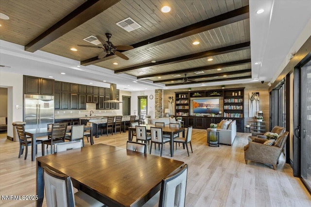 2675 Weymoor Ct, Reno, NV 89521 - dining space with a ceiling fan, light wood-style flooring, wood ceiling with exposed beams, and recessed lighting