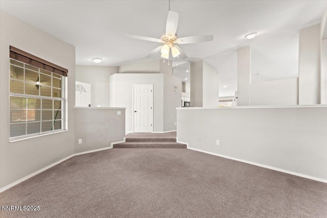 4515 Vista Mountain Dr, Sparks, NV 89436 - unfurnished room featuring carpet flooring, ceiling fan, baseboards, and vaulted ceiling