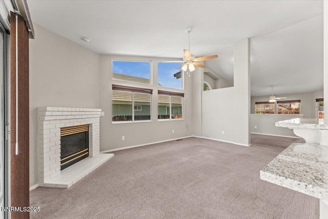4515 Vista Mountain Dr, Sparks, NV 89436 - unfurnished living room with ceiling fan, carpet, a fireplace, baseboards, and vaulted ceiling