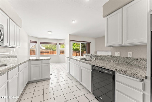 4515 Vista Mountain Dr, Sparks, NV 89436 - kitchen featuring black dishwasher, a peninsula, a sink, and white cabinetry