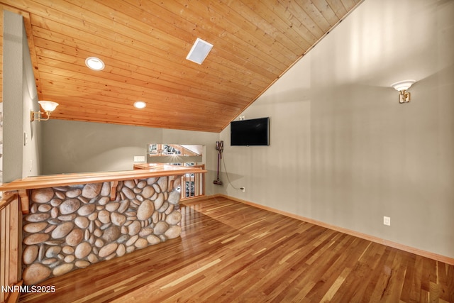 1445 Austrian Pine Rd, Reno, NV 89511 - bar area with vaulted ceiling, wood finished floors, wood ceiling, and baseboards