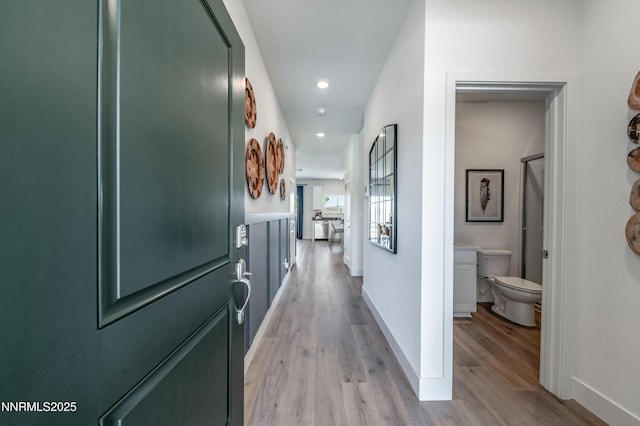 7609 Apex Pl # 113, Reno, NV 89506 - hall with light wood-style flooring, baseboards, and recessed lighting
