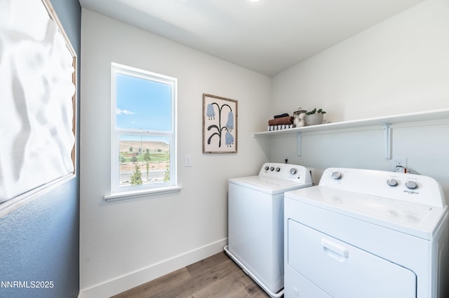 7609 Apex Pl # 113, Reno, NV 89506 - laundry room with independent washer and dryer, baseboards, and light wood-style flooring