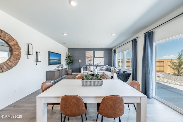 7609 Apex Pl # 113, Reno, NV 89506 - dining space with wood finished floors, recessed lighting, and baseboards
