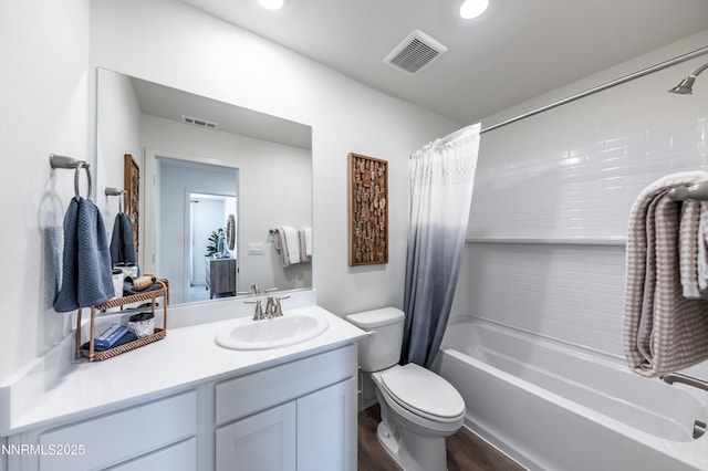 7609 Apex Pl # 113, Reno, NV 89506 - full bath with wood finished floors, vanity, toilet, shower / tub combo with curtain, and recessed lighting