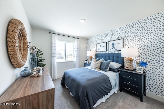 7609 Apex Pl # 113, Reno, NV 89506 - bedroom featuring wallpapered walls, an accent wall, carpet floors, and baseboards
