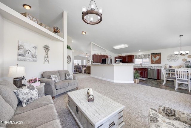240 Mary Lou Ln, Fernley, NV 89408 - carpeted living area featuring a chandelier, a sink, recessed lighting, lofted ceiling, and baseboards