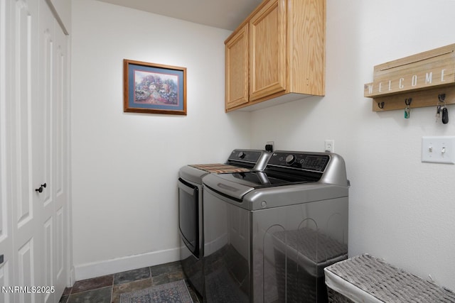240 Mary Lou Ln, Fernley, NV 89408 - laundry area with cabinet space, independent washer and dryer, baseboards, and dark stone finish flooring