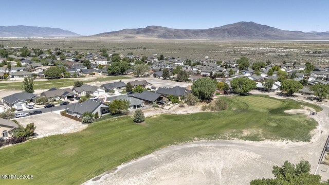 240 Mary Lou Ln, Fernley, NV 89408 - aerial view of residential area featuring a mountain backdrop and a local golf course