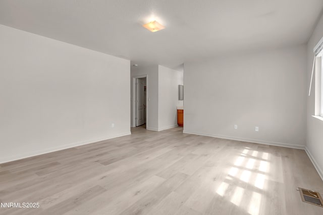 17330 Desert Lake Dr, Reno, NV 89508 - spare room featuring light wood-type flooring and baseboards