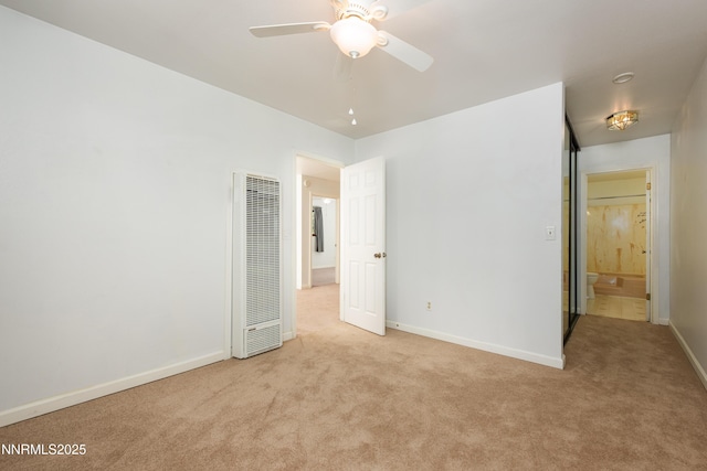769 Tina Ct # H, Stateline, NV 89449 - unfurnished bedroom featuring a heating unit, carpet, and baseboards