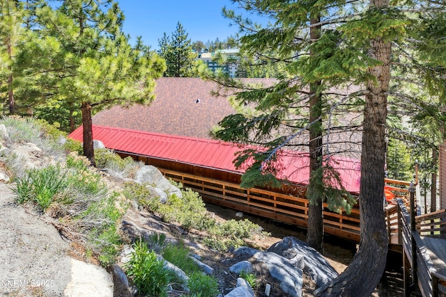 383 Tramway Dr Unit B, Stateline, NV 89449 - view of property exterior with metal roof and a wooden deck
