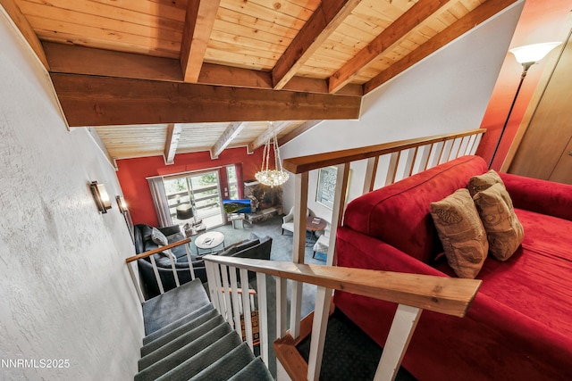 383 Tramway Dr Unit B, Stateline, NV 89449 - staircase featuring wooden ceiling, a chandelier, and carpet