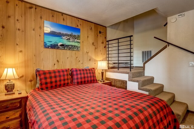 758 Milky Way Ct Unit B, Stateline, NV 89449 - bedroom with wood walls and baseboards