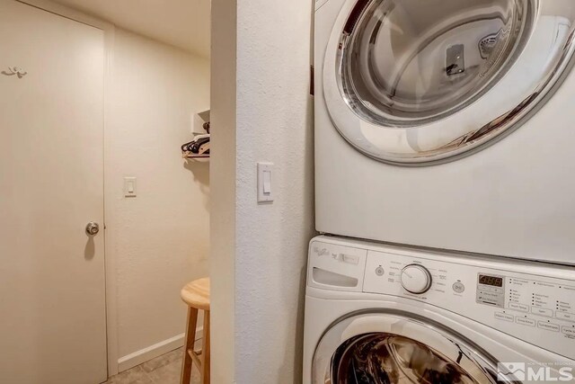 758 Milky Way Ct Unit B, Stateline, NV 89449 - laundry room with stacked washer / drying machine and baseboards