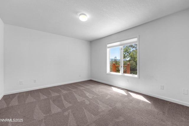 4360 Slide Mountain Cir, Reno, NV 89511 - carpeted spare room featuring baseboards