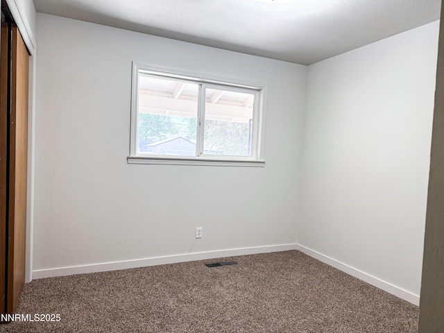 604 W Winnie Ln, Carson City, NV 89703 - unfurnished bedroom with carpet floors, a closet, and baseboards