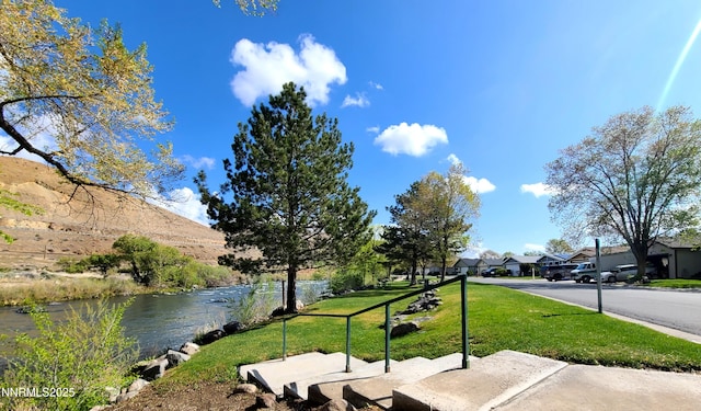 244 Ave De La Couleurs Ave, Sparks, NV 89434 - view of green lawn with a water view and a residential view