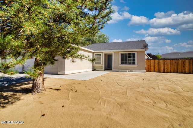 1563 Maria Ct, Fernley, NV 89408 - view of front of home with stucco siding and a patio
