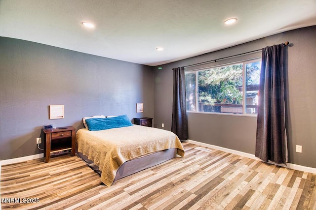 1563 Maria Ct, Fernley, NV 89408 - bedroom with light wood finished floors, recessed lighting, and baseboards