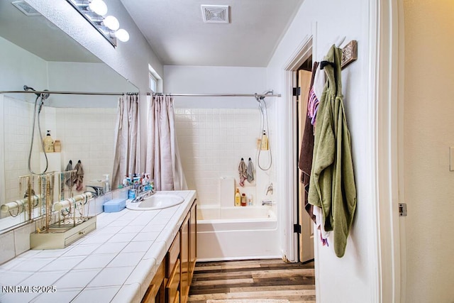 1563 Maria Ct, Fernley, NV 89408 - full bathroom with shower / tub combo with curtain, wood finished floors, and vanity