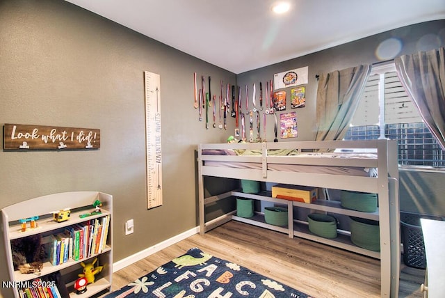 1563 Maria Ct, Fernley, NV 89408 - bedroom with wood finished floors and baseboards
