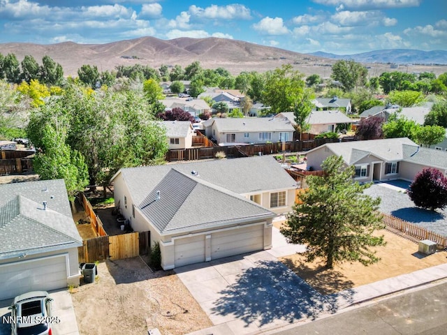 1563 Maria Ct, Fernley, NV 89408 - aerial perspective of suburban area featuring a mountain backdrop