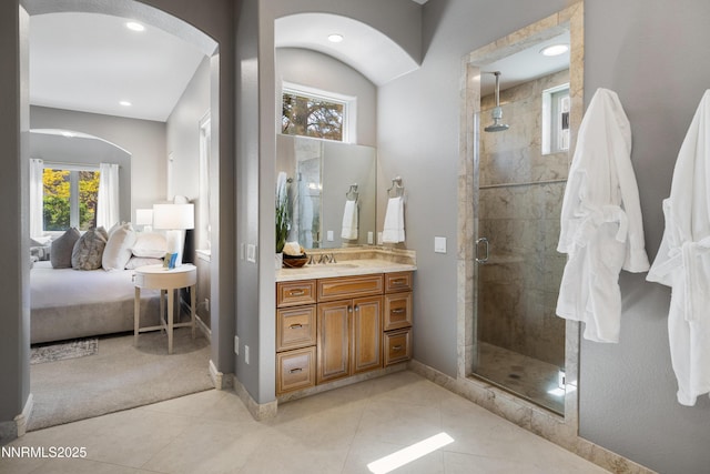 193 N Argyle Ct, Reno, NV 89511 - ensuite bathroom featuring a stall shower, baseboards, vanity, and recessed lighting