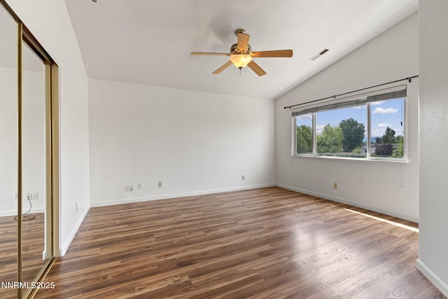 3095 Fairwood Dr, Reno, NV 89502 - unfurnished bedroom with lofted ceiling, wood finished floors, baseboards, a closet, and ceiling fan