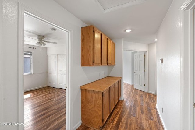 3095 Fairwood Dr, Reno, NV 89502 - hallway with dark wood finished floors, baseboards, and recessed lighting