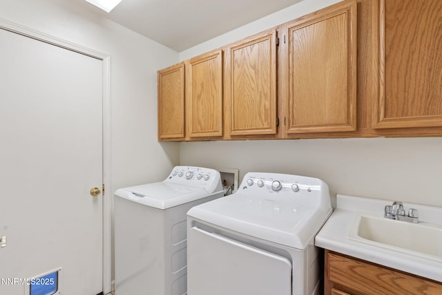 3095 Fairwood Dr, Reno, NV 89502 - laundry area with cabinet space and washing machine and clothes dryer
