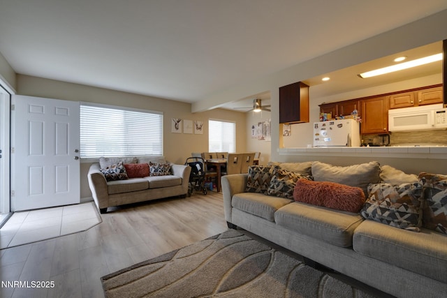 4930 Catalina Dr Apt 3, Reno, NV 89502 - living room featuring light wood-type flooring, ceiling fan, and recessed lighting