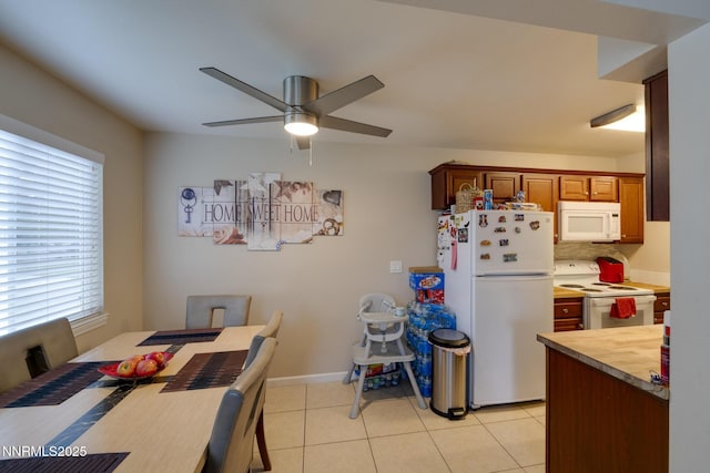 4930 Catalina Dr Apt 3, Reno, NV 89502 - dining room with ceiling fan and light tile patterned floors