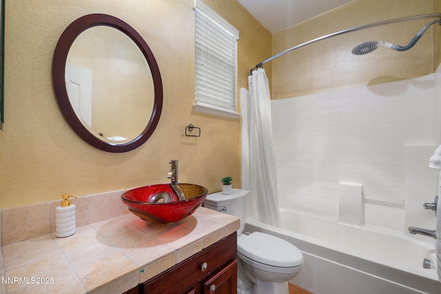 11285 Messina Way, Reno, NV 89521 - full bathroom with shower / bath combo with shower curtain, vanity, toilet, and a textured wall