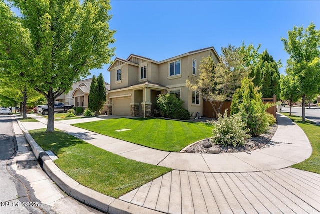 2349 Dodge Dr, Sparks, NV 89436 - view of front of house with an attached garage, a front lawn, driveway, and stucco siding