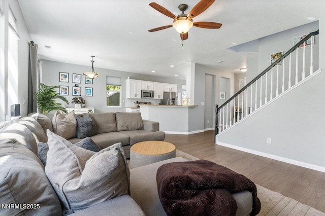2349 Dodge Dr, Sparks, NV 89436 - living area featuring stairway, a ceiling fan, dark wood-style flooring, baseboards, and recessed lighting