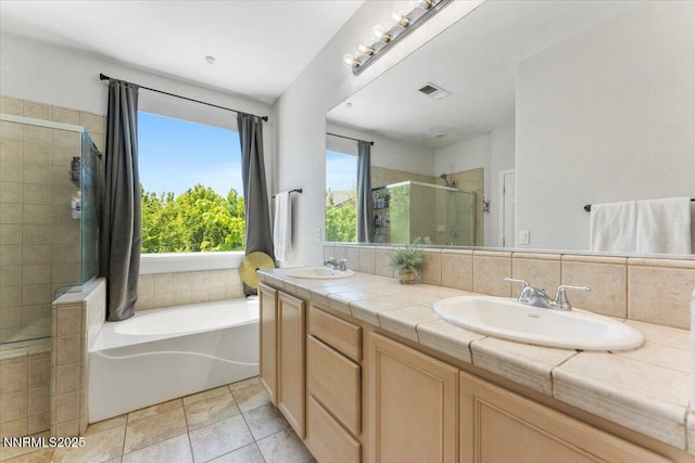 2349 Dodge Dr, Sparks, NV 89436 - full bathroom with a stall shower, a garden tub, and double vanity